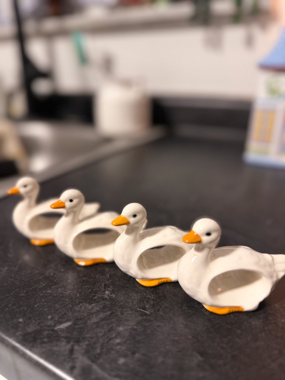 Set of Four White Ceramic Goose or Duck Napkin Rings